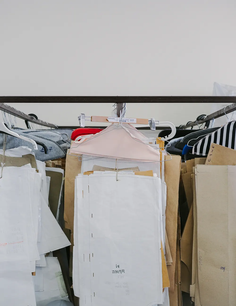 Garment racks and patterns in the production studio