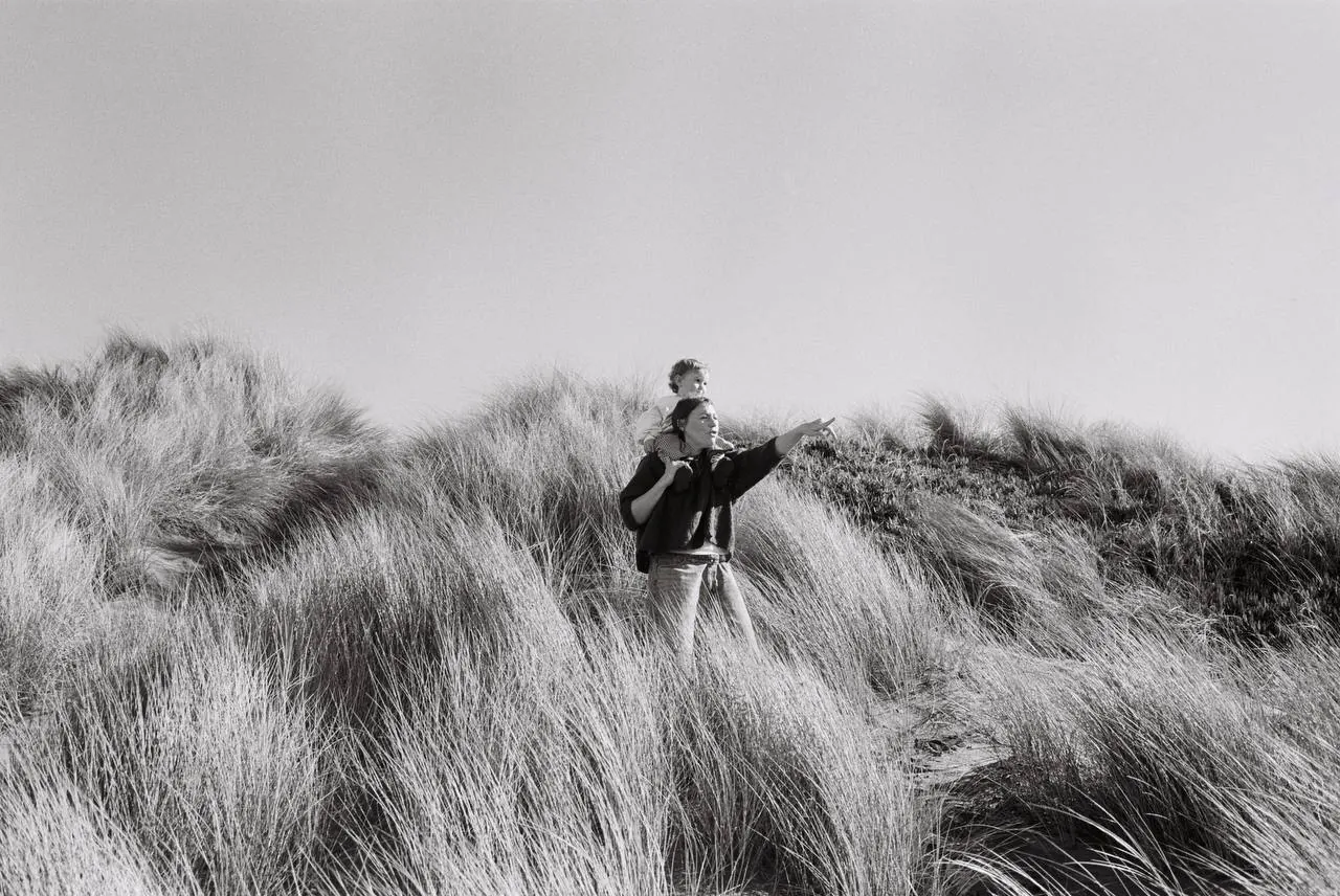 Figure standing in the dunes